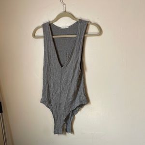 Gray low v neck bodysuit, small